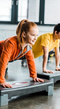 Children,Doing,Plank,Exercise,With,Step,Platforms