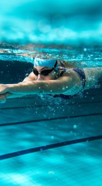 Female,Swimmer,At,The,Swimming,Pool.underwater,Photo.
